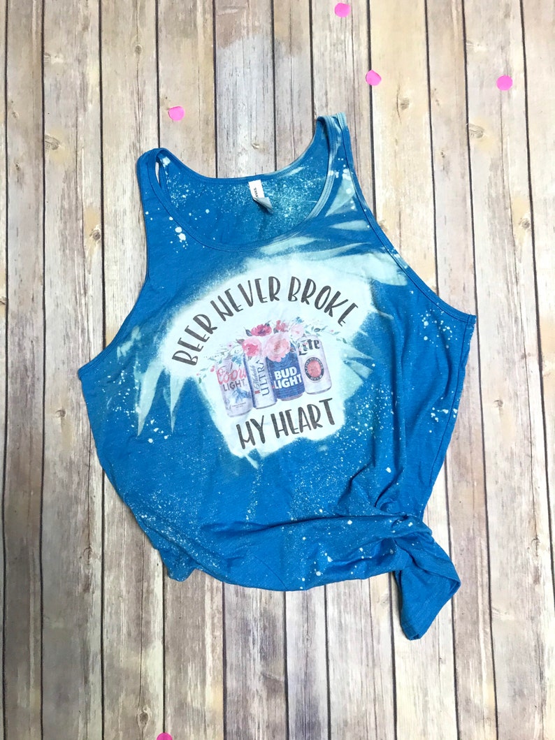 A \u201c Beer never broke my heart\u201d blue Bella Canvas tank top