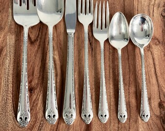 holmes and edwards inlaid silver