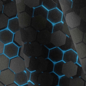 May include: A close-up of a fabric with a repeating hexagonal pattern in shades of gray and black. The design features bright blue lines outlining the honeycomb shapes, creating a futuristic, tech-inspired look. The fabric has a textured appearance.