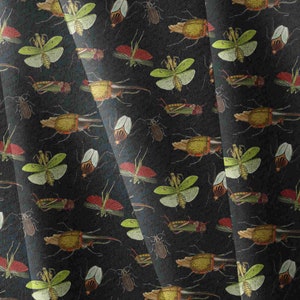 May include: A black fabric with a repeating pattern of various insects, including beetles, mantises, and grasshoppers. The insects are depicted in a vintage style with intricate details and vibrant colours.