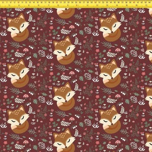 May include: A dark maroon fabric featuring a repeating pattern of sleeping brown foxes, white mushrooms, and green foliage. A yellow measuring tape is visible along the top and left edges, showing a scale of 48 inches and 15 inches respectively.