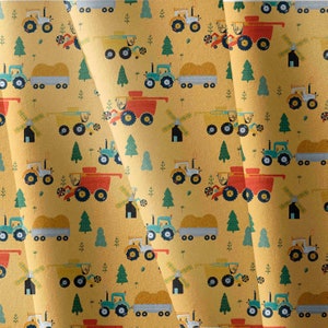 May include: A yellow background with a repeating pattern of farm equipment, including tractors, combines, and hay bales. The pattern is offset by green trees and windmills.