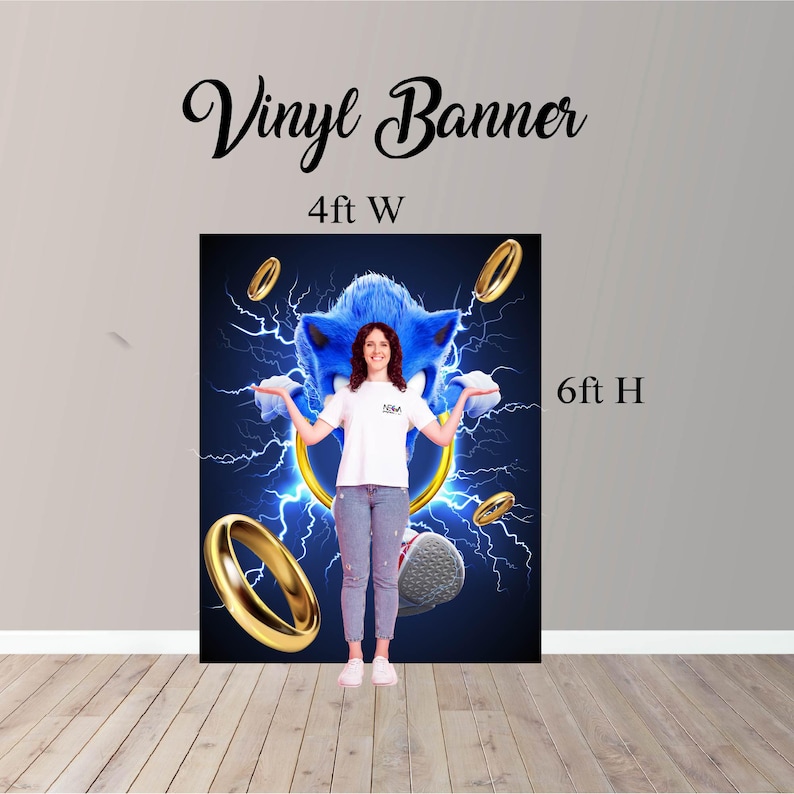 May include: A vinyl banner featuring a blue Sonic the Hedgehog character with gold rings and lightning bolts on a dark blue background. The banner is 4 feet wide and 6 feet high.