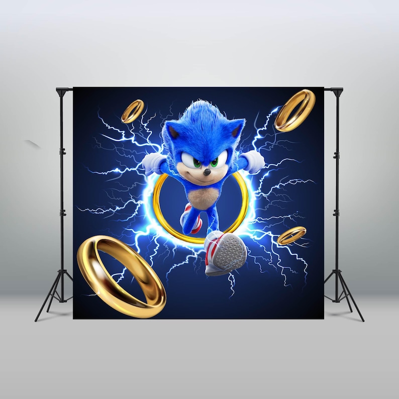 May include: A blue and red Sonic the Hedgehog character running through a golden ring with blue lightning bolts in the background. The backdrop is a dark blue color.