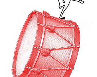 May include: A red drum with a textured surface and rope tensioning hardware, featuring a black line-art illustration of a person balancing on one leg on top of the drum. The drum is angled slightly, showing its circular side and rope details.