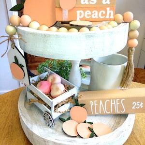 peach wood tiered tray decor