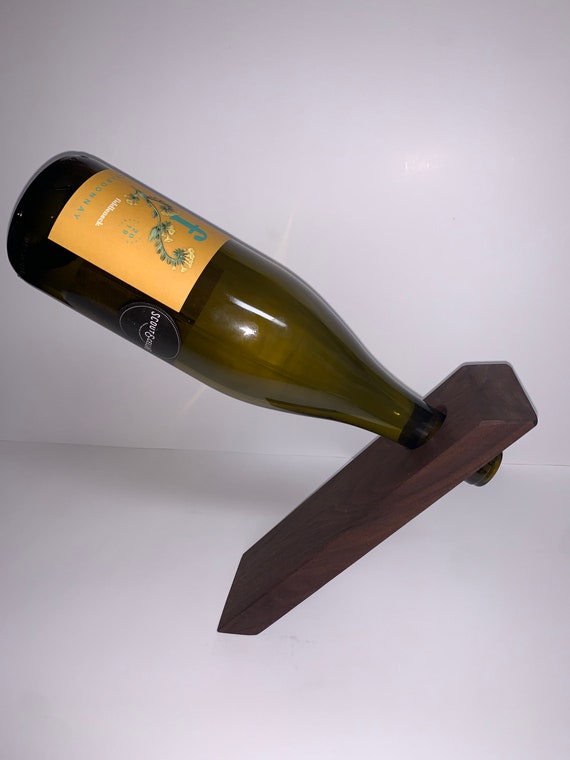 Floating balancing wine rack Etsy