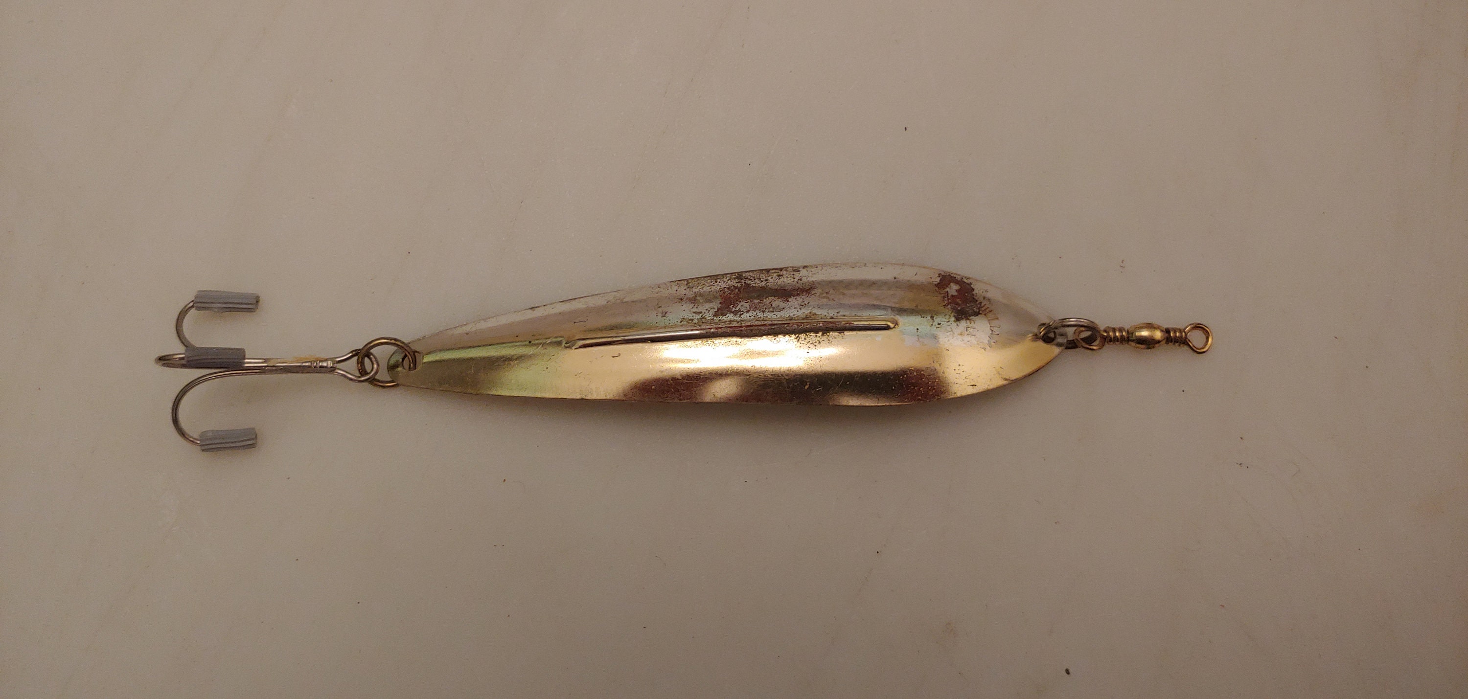 Vintage 1950s BrylCreem's Royal Spoon Gold Metal Spoon Fishing Lure.