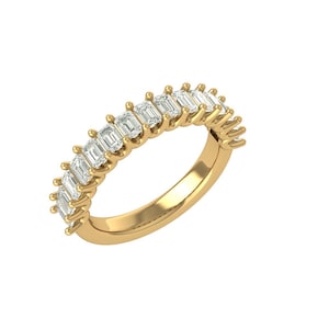 May include: A gold ring featuring a row of emerald-cut gemstones. The ring has a polished gold band and the gemstones are set closely together, creating a continuous sparkle. The ring is displayed against a white background.