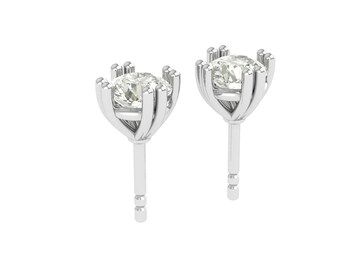 May include: A pair of stud earrings featuring a round, clear gemstone set in a silver-colored, pronged setting. The earrings have a post backing and are displayed against a white background.