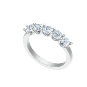 May include: A silver ring featuring five round, clear gemstones set in a row. The ring has a polished, reflective surface and is set against a white background. The gemstones are evenly spaced and appear to be of similar size.