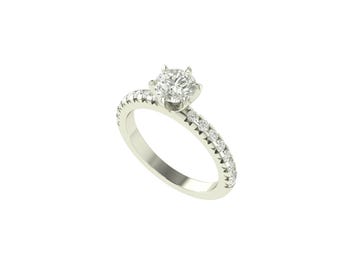 May include: A solitaire engagement ring with a large, round, clear gemstone set in a four-prong setting. The band is a light silver color and is encrusted with small, clear gemstones. The ring is set against a white background.