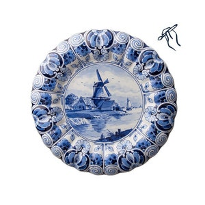 Wall plate Delft blue porcelain with Dutch landscape and scalloped edge, fully hand-painted with signature