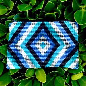 Etui met boze oog - blauwe ritstas - handgemaakte portemonnee - funky portemonnee - medicijnzakje - portemonnee met kralen - sieradenhouder reisformaat
