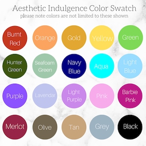 May include: A colour swatch chart titled Aesthetic Indulgence Colour Swatch with the text please note colours are not limited to these shown. It features twenty-eight circular colour samples labelled with names like Red, Gold, Navy Blue, and Black.