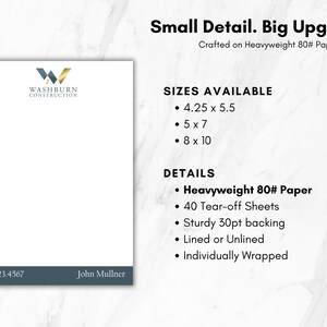 May include: A white notepad with the Washburn Construction logo, featuring a blue and gold W icon. The bottom blue bar displays the phone number 937.123.4567 and the name John Mullner. Available in 4.25 x 5.5, 5 x 7, and 8 x 10 inch sizes.