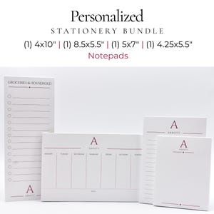 May include: A personalized stationery bundle of four white notepads with maroon text and lines. Includes a 4x10 inch Groceries & Household list, an 8.5x5.5 inch weekly planner, a 5x7 inch notepad, and a 4.25x5.5 inch notepad, all featuring the letter A and Abbott.