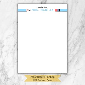 May include: White stationery with a light blue pencil design at the top, featuring the text "a note from MRS. MANILLA." The bottom of the stationery reads "Proof Before Printing 80# Premium Paper."
