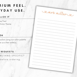 May include: A white notepad with horizontal black lines and the text mrs. miller in orange cursive script with heart accents at the top. The image includes text about personalisation options, ink colour choices, and custom request instructions.