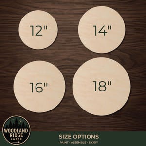 May include: Four circular light-colored wooden cutouts arranged in a grid. Each circle features a dark green printed number indicating its diameter in inches: 12", 14", 16", and 18". A circular logo in the corner reads Woodland Ridge Laser.