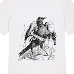 May include: White t-shirt featuring a black and white illustration of a crow holding a scythe. The crow is wearing a belt and standing on a small platform. The text "White" is at the bottom of the shirt.