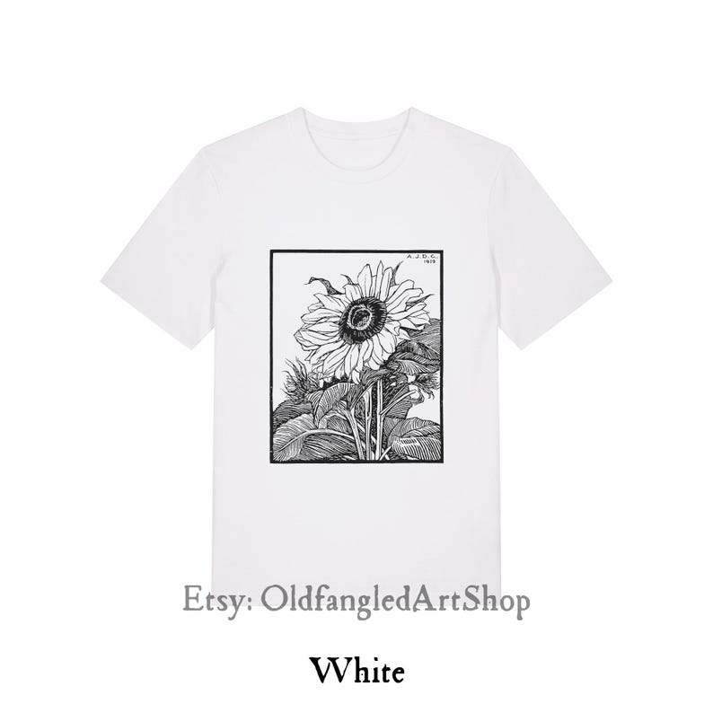 K&ouml;nnte beinhalten: Wei&szlig;es T-Shirt mit einer Schwarz-Wei&szlig;-Illustration einer Sonnenblume in einem rechteckigen Rahmen. Das T-Shirt hat kurze &Auml;rmel und einen Rundhalsausschnitt. Der Text "White" steht unten auf dem Shirt.