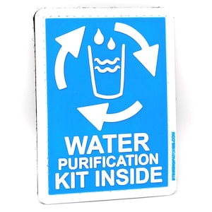 May include: A blue and white patch with a water purification symbol and the text "WATER PURIFICATION KIT INSIDE".