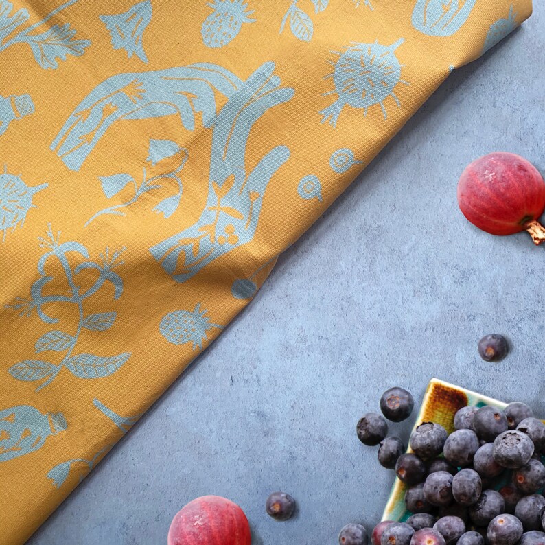 A tea towel fit to be a Tapestry! Summer Forager tea towel is inspired by our connection to nature, food and sustainability. It is part of a tea towel set focusing on the seasons and different foraging finds in each.