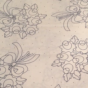 May include: White fabric with a repeating pattern of black line drawings of bouquets of roses with bows. The fabric has a subtle white polka dot pattern.