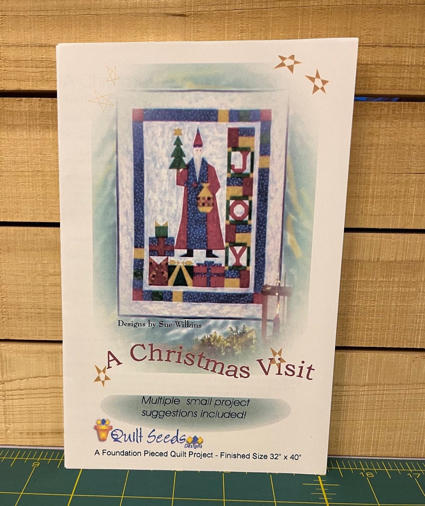 A Christmas Visit Wall Hanging Pattern - Designed By Sue Wilkins of Quilt Seeds Designs - 32" x 40"