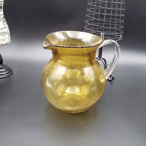 Vintage hand blown Amber Pitcher art, controlled bubble clear Handle