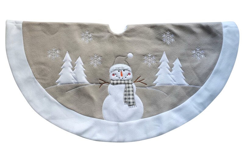 May include: A semi-circular Christmas tree skirt in a soft beige fabric with a wide white border. The design features an embroidered white snowman wearing a plaid scarf and hat, surrounded by white embroidered pine trees and snowflakes.