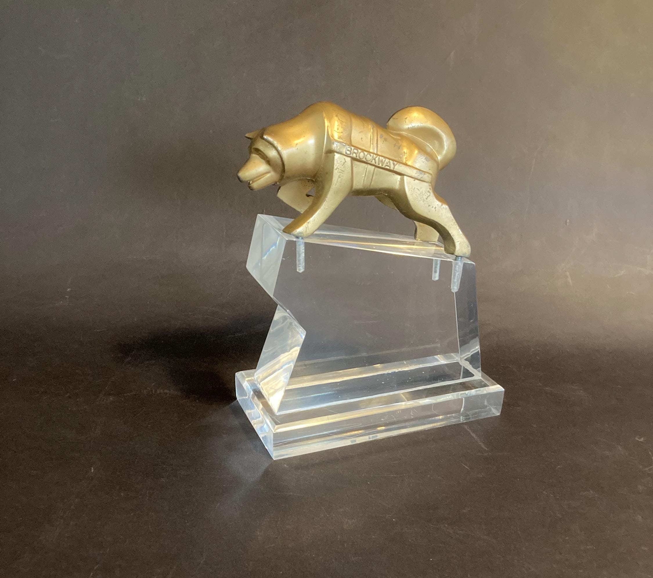 Extraordinary Mid-century Brockway Husky Hood Ornament on Lucite