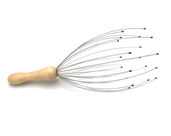 Head massager with wooden handle by cano-flow