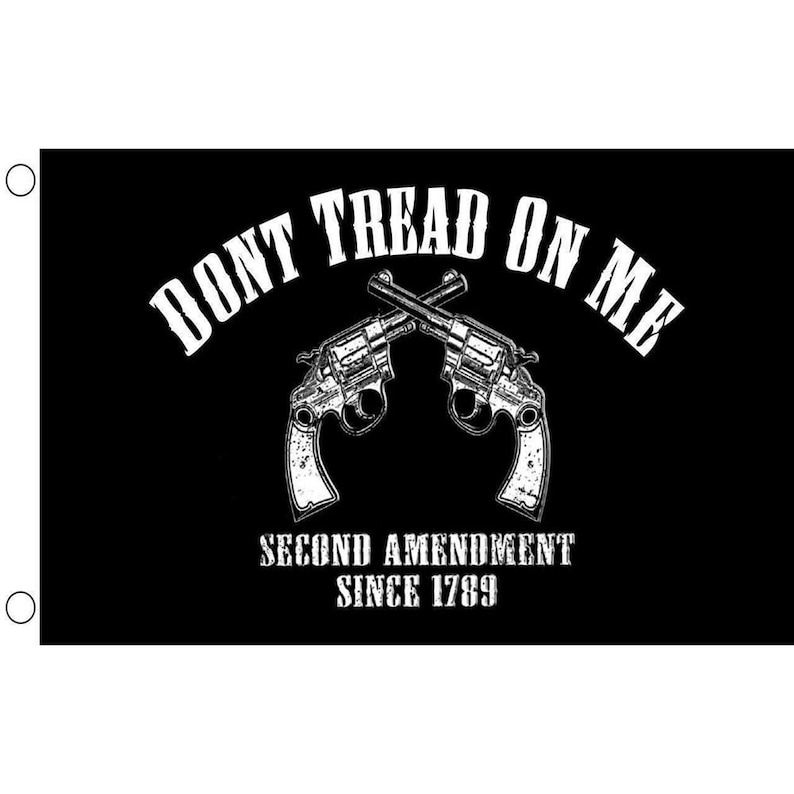 May include: Black flag featuring the text "DON'T TREAD ON ME" in white, arched above two crossed revolvers. Below the revolvers, the text reads "SECOND AMENDMENT SINCE 1789" in white.