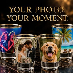 May include: Four clear glass shot glasses with gold rims, each featuring a different custom photographic print. The images include two people at a party, a bride and groom, a golden retriever, and a tropical beach scene with the text YOUR PHOTO. YOUR MOMENT.