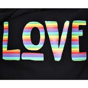 May include: Black canvas tote bag with the word "LOVE" printed in rainbow colors.