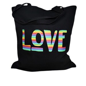 May include: Black canvas tote bag with rainbow striped "LOVE" text.