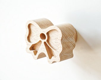 Bow wooden button for drawer and cabinet door