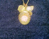 Vintage Gold Colored Necklace with Rose Locket, Butterfly, and Various Charms
