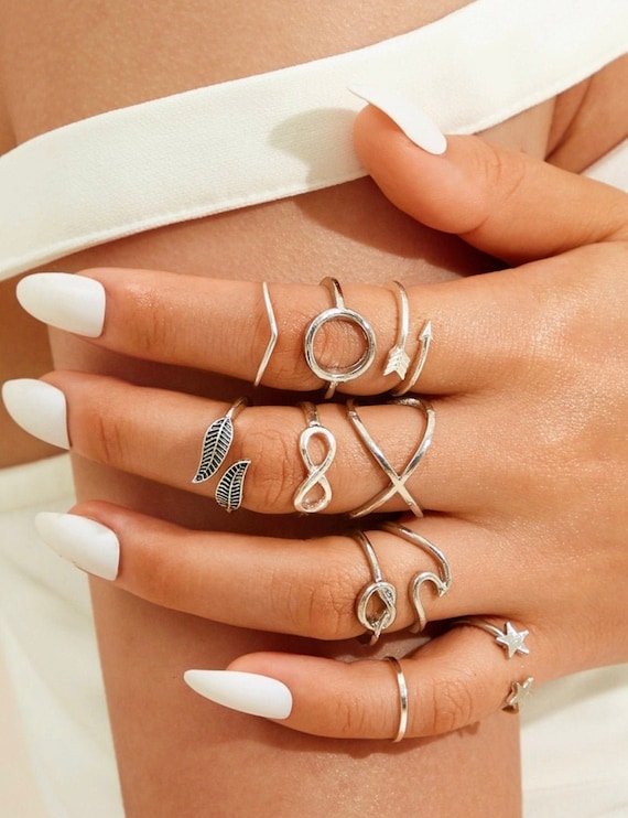 Infinity arrow ring store