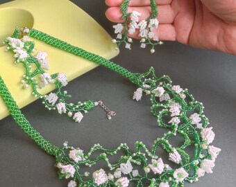 Jewelry with spring flowers. Jewelry with pearls and white flowers. Beaded jewelry set. Bouquet of lilies of the valley. Layered necklace.