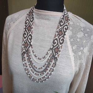 Necklace made of handmade beads, long Ukrainian beads, gerdan. Long beads in Ukrainian style with ethnic ornaments.