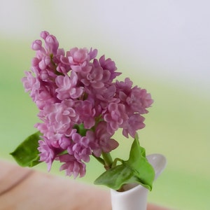 Lilacs. A branch of lilacs from polymer clay. Lilac flowers. Realistic lilacs from cold porcelain. Lilacs in a vase.Lilac flower arrangement