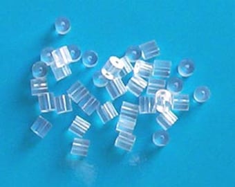 Approx 100 plastic comfort backs for fish hook earrings PLEASE READ DESCRIPTION