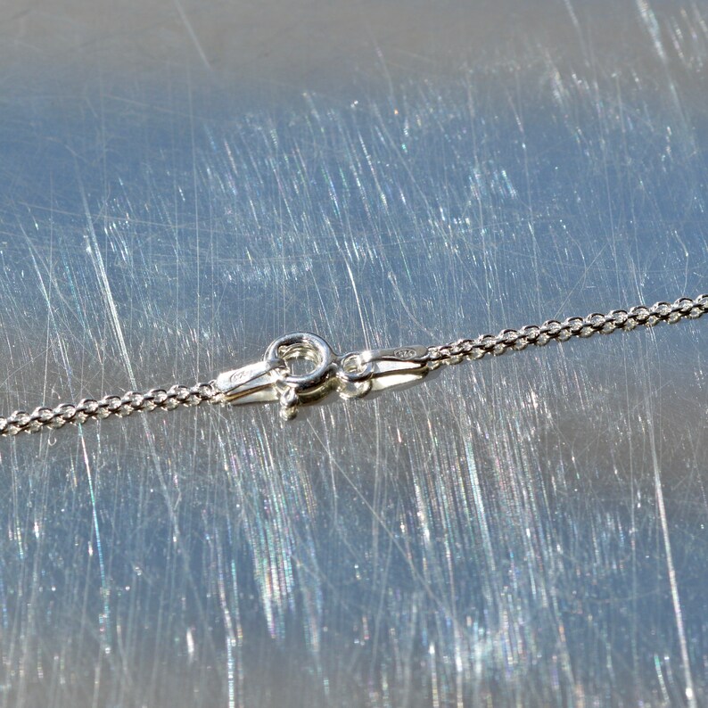 Spring from series Four Seasons recycled sterling silver.