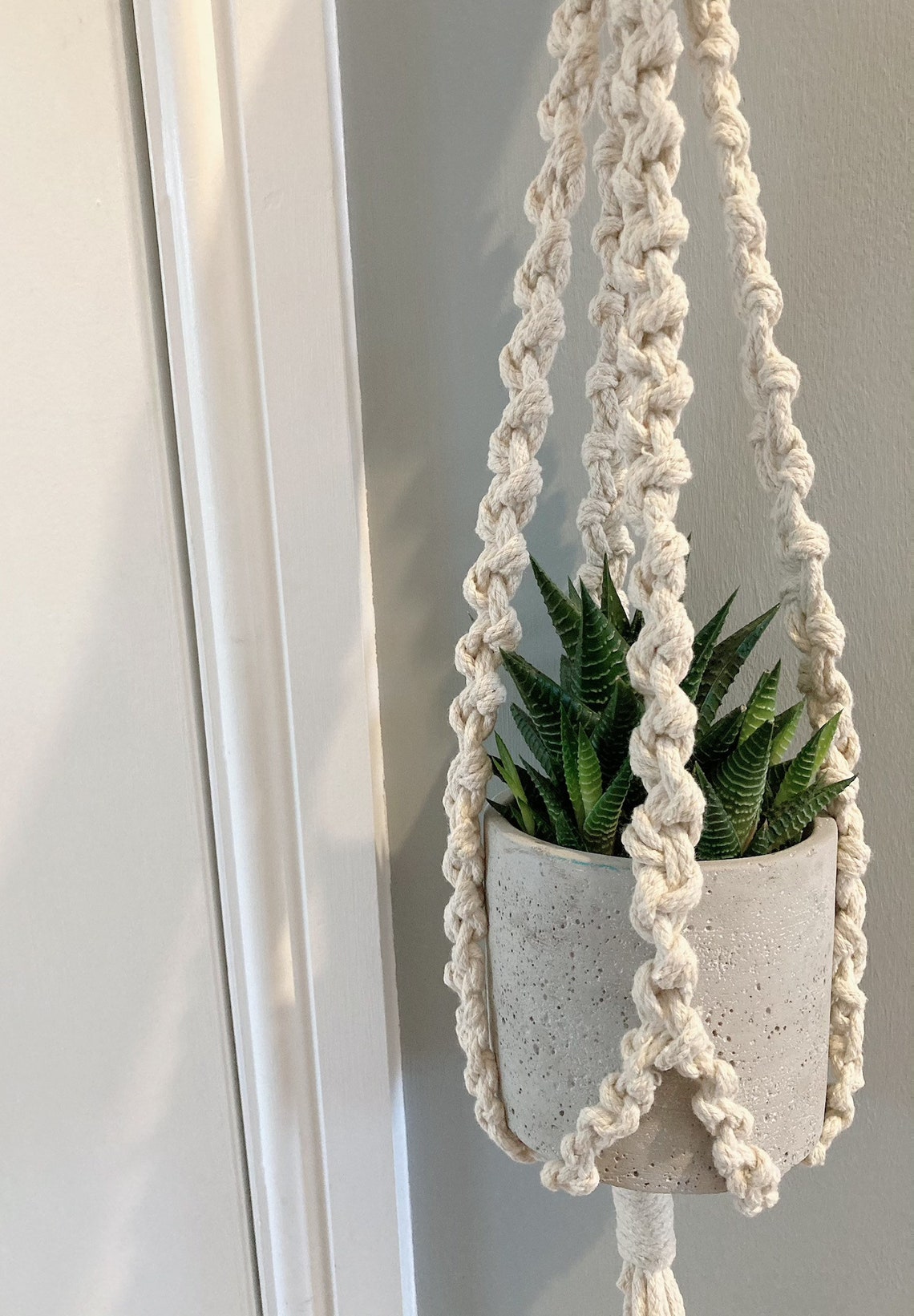Handmade macrame rope plant hanger for indoor plants. Perfect Etsy