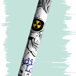 May include: A white pen with a black skull and crossbones design, blue and yellow accents, and the text "Radioactive" in blue.