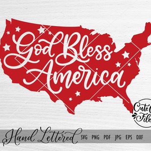 May include: A red outline of the United States of America with the text "God Bless America" in white cursive lettering. There are small white stars scattered around the outline. The text "Hand Lettered" appears below the outline.