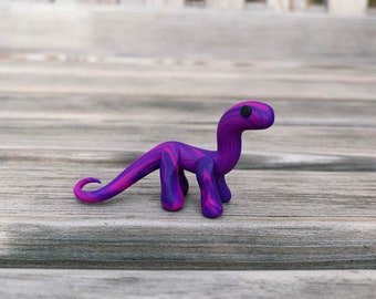 pink dinosaur figurines